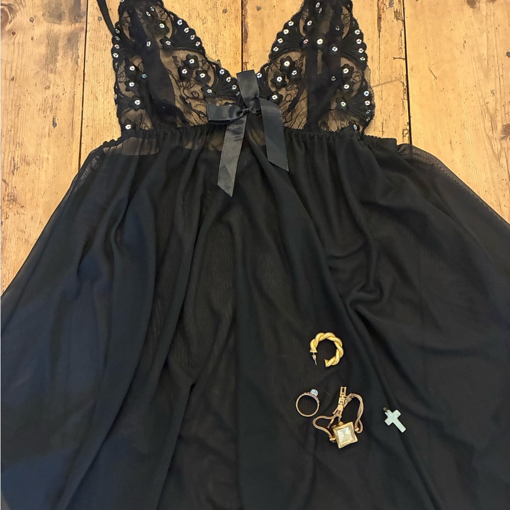 Black Nightgown with Lace Details and Assorted jewelry